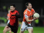 26 February 2011; Ciaran McKeever, Armagh, in action against Martin Clarke, Down. Allianz Football League, Division 1, Round 3, Down v Armagh, Pairc Esler, Newry, Co. Down. Picture credit: Oliver McVeigh / SPORTSFILE