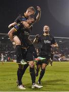14 October 2016; Ciaran Kilduff of Dundalk celebrates after scoring his side's third goal with teammates Daryl Horgan and Dane Massey during the SSE Airtricity League Premier Division match between Shamrock Rovers and Dundalk at Tallaght Stadium in Dublin. Photo by David Maher/Sportsfile