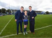 15 October 2016; Leinster matchday mascot Mark Canniffe with Leinster's Tom Daly and Jonathan Sexton ahead of the European Rugby Champions Cup Pool 4 Round 1 match between Leinster and Castres at the RDS Arena in Dublin. Photo by Stephen McCarthy/Sportsfile
