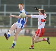 27 February 2011; Padraig Clancy, Laois, in action against Brian McCallion, Derry. Allianz Football League, Division 2, Round 3, Derry v Laois, Celtic Park, Derry. Picture credit: Oliver McVeigh / SPORTSFILE