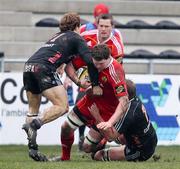 27 February 2011; Donnacha Ryan, Munster, is tackled by Giulio Toniolatti and Garreth Krause, right, Aironi. Celtic League, Aironi v Munster, Stadio Zaffanella, Italy. Picture credit: Roberto Bregani / SPORTSFILE