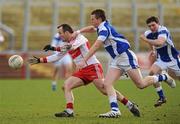 27 February 2011; Paddy Bradley, Derry, in action against Kevin Meaney, Laois. Allianz Football League, Division 2, Round 3, Derry v Laois, Celtic Park, Derry. Picture credit: Oliver McVeigh / SPORTSFILE