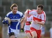 27 February 2011; Billy Sheehan, Laois, in action against Barry McGoldrick, Derry. Allianz Football League, Division 2, Round 3, Derry v Laois, Celtic Park, Derry. Picture credit: Oliver McVeigh / SPORTSFILE