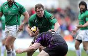 27 February 2011; Mike Swift, Connacht, is tackled by Ryan Bevington, Ospreys. Celtic League, Ospreys v Connacht, Liberty Stadium, Swansea, Wales. Picture credit: Steve Pope / SPORTSFILE