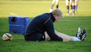 28 February 2011; Leinster's Leo Cullen stretches during squad training ahead of their Celtic League game against Scarlets on Friday. Leinster Rugby Media Briefing and Squad Training, UCD, Belfield, Dublin. Picture credit: Barry Cregg / SPORTSFILE