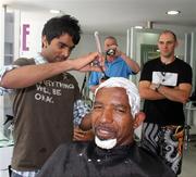 28 February 2011; Ireland head coach Phil Simmons has his head shaved as he took part in Today FM's 'Shave or Dye' campaign to raise funds for the Irish Cancer Society. Bounce Salon, Bangalore, India. Picture credit: Barry Chambers / Cricket Ireland / SPORTSFILE