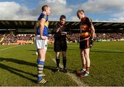 16 October 2016; Captains James Lavery of Maghery Seán MacDiarmada, left, and Gary McCooey of St Patrick’s, right, and referee Luke Pearce, centre, during the coin toss ahead of the Armagh County Senior Club Football Championship Final game between Maghery Seán MacDiarmada and St Patrick's at Athletic Grounds in Armagh. Photo by Seb Daly/Sportsfile