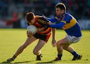 16 October 2016; Jason Duffy of St Patrick’s in action against Eóin Scullion of Maghery Seán MacDiarmada during the Armagh County Senior Club Football Championship Final game between Maghery Seán MacDiarmada and St Patrick's at Athletic Grounds in Armagh. Photo by Seb Daly/Sportsfile