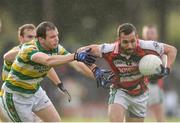 16 October 2016; George Durrant of Ballincollig in action against Alan Jennings of Carbery Rangers during the Cork County Senior Club Football Championship Final game between Ballincollig and Carbery Rangers at Páirc Ui Rinn in Cork. Photo by Eóin Noonan/Sportsfile