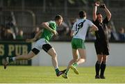 16 October 2016; Referee Fergal Barry fails to get out of the way of the action as Caoimghin McDonnell of Sarsfields and Ronan Sweeney of Moorefield chase a loose ball during the Kildare County Senior Club Football Championship Final game between Moorefield and Sarsfields at St Conleth's Park in Newbridge, Co Kildare. Photo by Piaras Ó Mídheach/Sportsfile