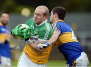 16 October 2016; Neil Gallagher of Glenswilly in action against Pauric Carr of Kilcar during the Donegal County Senior Club Football Championship Final game between Kilcar and Glenswilly at MacCumhaill Park in Ballybofey, Co. Donegal. Photo by Oliver McVeigh/Sportsfile