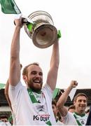 16 October 2016; Sarsfields captain Donnachadh McDonnell lifts the Dermot Bourke cup after the Kildare County Senior Club Football Championship Final game between Moorefield and Sarsfields at St Conleth's Park in Newbridge, Co Kildare. Photo by Piaras Ó Mídheach/Sportsfile