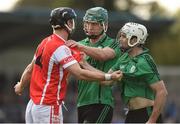 16 October 2016; Mark Schutte of Cuala tussles with Barry Aird, right, and Chris Crummey, centre, of Lucan Sarsfield during the Dublin County Senior Club Hurling Championship Semi-Finals game between Cuala and Lucan Sarsfields at Parnell Park in Dublin. Photo by Cody Glenn/Sportsfile