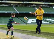17 October 2016; Former Mini Rugby player and Aviva Ambassador, Robbie Henshaw with current Aviva Mini Rugby star Eóin Kelly, 9, Seapoint RC pictured during the Aviva's Mini Rugby Season Launch at the Aviva Stadium in Dublin.  The four provincial Aviva Mini Rugby Festivals are taking place throughout October and every club that competes is in with a chance to play in the Aviva National Mini Rugby Festival in May 2017, which he held on the famous Aviva Stadium pitch.  Photo by Sam Barnes/Sportsfile