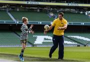 17 October 2016; Former Mini Rugby player and Aviva Ambassador, Robbie Henshaw with current Aviva Mini Rugby star Tom Kearney, 9, Greystones RFC pictured during the Aviva's Mini Rugby Season Launch at the Aviva Stadium in Dublin.  The four provincial Aviva Mini Rugby Festivals are taking place throughout October and every club that competes is in with a chance to play in the Aviva National Mini Rugby Festival in May 2017, which he held on the famous Aviva Stadium pitch.  Photo by Sam Barnes/Sportsfile