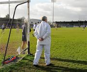 27 February 2011; An umpire keeps an eye on on the game. Walsh Cup Final, Dublin v Kilkenny, Parnell Park, Donnycarney, Dublin. Picture credit: Ray McManus / SPORTSFILE