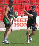 28 February 2011; Ireland's Alex Cusack and team-mate Trent Johnston during a squad rugby game. 2011 ICC Cricket World Cup, hosted by India, Sri Lanka and Bangladesh, Bangalore, India. Picture credit: Barry Chambers / Cricket Ireland / SPORTSFILE