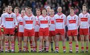 27 February 2011; The Derry team stand for the National Anthem. Allianz Football League, Division 2, Round 3, Derry v Laois, Celtic Park, Derry. Picture credit: Oliver McVeigh / SPORTSFILE