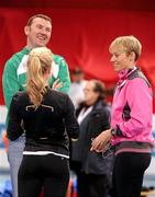 3 March 2011; Ireland's Derval O'Rourke, right, and Ailis McSweeney with their coach Sean Cahill in the Palais Omnisports de Paris-Bercy ahead of this weekend's European Indoor Athletics Championship. Palais Omnisports de Paris-Bercy, Paris, France. Picture credit: Brendan Moran / SPORTSFILE