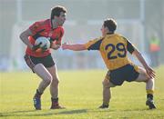 3 March 2011; Will Kennedy, UCC, in action against Eamon Doherty, DCU. Ulster Bank Sigerson Cup Football Quarter-Final, DCU v UCC, New GAA, UCD, Belfield, Dublin. Picture credit: Matt Browne / SPORTSFILE