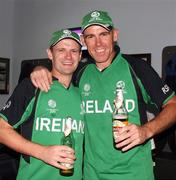 2 March 2011; Ireland's William Porterfield, left, and team-mate Trent Johnson celebrate after their side's victory over England. 2011 ICC Cricket World Cup, hosted by India, Sri Lanka and Bangladesh, Bangalore, India. Picture credit: Barry Chambers / Cricket Ireland / SPORTSFILE