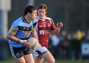 3 March 2011; John O'Loughlin, UCD, in action against Kevin Conlon, NUIG. Ulster Bank Sigerson Cup Football Quarter-Final, UCD v NUIG, Castle Pitch, UCD, Belfield, Dublin. Picture credit: Matt Browne / SPORTSFILE