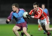 25 February 2011; Aidan Breen, St. Michael's, Enniskillen, in action against Mark McAleer, St. Patrick's Academy, Dungannon. BT MacRory Cup Semi-Final, St. Patrick's Academy, Dungannon v St. Michael's, Enniskillen, Healy Park, Omagh, Co. Tyrone. Picture credit: Oliver McVeigh / SPORTSFILE