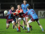 25 February 2011; Sean Quinn, St. Patrick's Academy, Dungannon, in action against Kane Connor and Rory Brennan, St. Michael's, Enniskillen. BT MacRory Cup Semi-Final, St. Patrick's Academy, Dungannon v St. Michael's, Enniskillen, Healy Park, Omagh, Co. Tyrone. Picture credit: Oliver McVeigh / SPORTSFILE