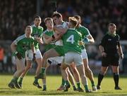 16 October 2016; Con Kavanagh of Sarsfields is tackled by Moorefield's, from left, James Murray, Liam Healy and David Whyte during the Kildare County Senior Club Football Championship Final game between Moorefield and Sarsfields at St Conleth's Park in Newbridge, Co Kildare. Photo by Piaras Ó Mídheach/Sportsfile