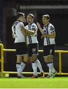 17 October 2016; Dane Massey, centre, of Dundalk celebrates after scoring his side's first goal with teammates Brian Gartland and David McMillan during the SSE Airtricity League Premier Division game between Longford Town and Dundalk at City Calling Stadium, Longford. Photo by David Maher/Sportsfile