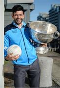 18 October 2016; AIG Insurance, proud sponsor of Dublin GAA, held a reception at its offices today to mark the Dublin football team’s All-Ireland success. Pictured is Cian O'Sullivan of Dublin with the Sam Maguire cup. For more information about AIG Insurance’s products and services go to www.aig.ie or call 1890 50 27 27. AIG Offices in North Wall Quay, Dublin. Photo by Cody Glenn/Sportsfile