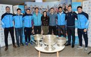 18 October 2016; AIG Insurance, proud sponsor of Dublin GAA, held a reception at its offices today to mark the Dublin football team’s All-Ireland success. Pictured are, from left, Dublin players James McCarthy, David Byrne, Bernard Brogan, Michael Fitzsimons, with members of the AIG Gen WHY Team Aisling Fox and David Neil, Cian O'Sullivan, Paul Flynn and Colm Basquell, with the Sam Maguire cup. For more information about AIG Insurance’s products and services go to www.aig.ie or call 1890 50 27 27. AIG Offices in North Wall Quay, Dublin. Photo by Cody Glenn/Sportsfile