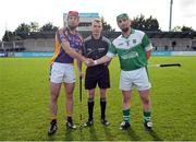 16 October 2016; Kilmacud Crokes captain Bill O'Carroll shakes hands with O'Toole's captain Philip Brennan in the presence of referee Thomas Gleeson ahead of the Dublin County Senior Club Hurling Championship Semi-Finals game between Kilmacud Crokes and O'Toole's at Parnell Park in Dublin. Photo by Cody Glenn/Sportsfile