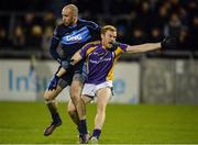 19 October 2016; Paul Cunningham of St Jude's tussles with Mark Vaughan of Kilmacud Crokes during the Dublin County Senior Club Football Championship Quarter-Final match between St Jude's and Kilmacud Crokes at Parnell Park in Dublin. Photo by Piaras Ó Mídheach/Sportsfile