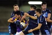 19 October 2016; Cian O'Sullivan of Kilmacud Crokes in action against St Jude's, from left, Colm Murphy, Séamus Ryan, Paul Courtney and Kieran Doherty during the Dublin County Senior Club Football Championship Quarter-Final match between St Jude's and Kilmacud Crokes at Parnell Park in Dublin. Photo by Piaras Ó Mídheach/Sportsfile