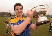 5 March 2011; Colaiste Phadraig captain Sean Denvir celebrates with the cup after the game. Trench Cup Final, Colaiste Phadraig v WIT, New GAA, UCD, Belfield, Dublin. Photo by Sportsfile