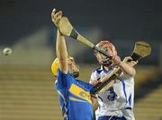 5 March 2011; Pauric Mahony, Waterford, in action against David Young, Tipperary. Allianz Hurling League Division 1 Round 3, Tipperary v Waterford, Semple Stadium, Thurles, Co. Tipperary. Picture credit: Matt Browne / SPORTSFILE
