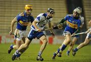 5 March 2011; Darragh Fives, Waterford, in action against Pa Bourke, left, and Patrick Maher, Tipperary. Allianz Hurling League Division 1 Round 3, Tipperary v Waterford, Semple Stadium, Thurles, Co. Tipperary. Picture credit: Matt Browne / SPORTSFILE