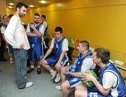 5 March 2011; Conor Meany, member of the Men's Superleague National Cup Champions, UCD Marian, has a word with the members of the Connaught squad between games. Special Olympics Ireland National Basketball Cup, Loughlinstown Leisure Centre, Dun Laoghaire, Co. Dublin. Picture credit: Stephen McCarthy / SPORTSFILE