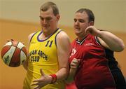 5 March 2011; Keith Hynes, Navan Arch Club, Meath, in action against Stephen Carroll, COPE Foundation, Cork. Special Olympics Ireland National Basketball Cup, Loughlinstown Leisure Centre, Dun Laoghaire, Co. Dublin. Picture credit: Stephen McCarthy / SPORTSFILE
