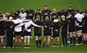 21 October 2016; The Ulster squad and staff huddle in the middle of the pitch for a minute silence dedicated to the late Anthony Foley ahead of the captain's run at the Kingspan Stadium in Ravenhill Park, Belfast. Photo by David Fitzgerald/Sportsfile