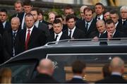 21 October 2016; Brian O'Driscoll, who captained Leinster, Ireland and the British and Irish Lions, looks on as the hearse arrives for the funeral of Munster Rugby head coach Anthony Foley at the St. Flannan’s Church, Killaloe, Co Clare. The Shannon club man, with whom he won 5 All Ireland League titles, played 202 times for Munster and was capped for Ireland 62 times, died suddenly in Paris on November 16, 2016 at the age of 42. Photo by Stephen McCarthy/Sportsfile