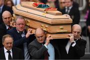 21 October 2016; Former Munster players, from left, John Langford, Mick Galwey, Peter Clohessy and Keith Wood carry the coffin of Munster Rugby head coach Anthony Foley leaves the St. Flannan’s Church, Killaloe, Co Clare. The Shannon club man, with whom he won 5 All Ireland League titles, played 202 times for Munster and was capped for Ireland 62 times, died suddenly in Paris on November 16, 2016 at the age of 42. Photo by Stephen McCarthy/Sportsfile