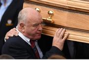 21 October 2016; Brendan Foley, father of Munster Rugby head coach Anthony Foley, carries the coffin of Munster Rugby head coach Anthony Foley at the St. Flannan’s Church, Killaloe, Co Clare. The Shannon club man, with whom he won 5 All Ireland League titles, played 202 times for Munster and was capped for Ireland 62 times, died suddenly in Paris on November 16, 2016 at the age of 42. Photo by Stephen McCarthy/Sportsfile