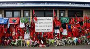 22 October 2016; A general view of Munster Rugby, Leinster Rugby and Connacht Rugby flags, scarves and flowers placed outside the Shannon RFC Club house in memory of the late Munster Rugby head coach Anthony Foley before the European Rugby Champions Cup Pool 1 Round 2 match between Munster and Glasgow Warriors at Thomond Park in Limerick. The Shannon club man, with whom he won 5 All Ireland League titles, played 202 times for Munster and was capped for Ireland 62 times, died suddenly in Paris on November 16, 2016 at the age of 42. Photo by Seb Daly/Sportsfile