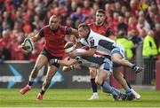 22 October 2016; Simon Zebo of Munster is tackled by Finn Russell and Simone Favaro of Glasgow during the European Rugby Champions Cup Pool 1 Round 2 match between Munster and Glasgow Warriors at Thomond Park in Limerick. Photo by Brendan Moran/Sportsfile