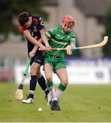22 October 2016; Keith Carmody of Ireland in action against John McNulty of Scotland during the 2016 U21 Hurling/Shinty International Series match between Ireland and Scotland at Bught Park in Inverness, Scotland. Photo by Piaras Ó Mídheach/Sportsfile