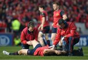 22 October 2016; Duncan Casey of Munster is attended by medical personnel before leaving the pitch with an injury during the European Rugby Champions Cup Pool 1 Round 2 match between Munster and Glasgow Warriors at Thomond Park in Limerick. Photo by Brendan Moran/Sportsfile