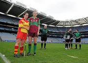6 March 2011; Team captains Méabh Mcoldrick, Eoghan Rua, and Elaine Cuddy, The Harps, shake hands before the start of the match. All-Ireland Intermediate Camogie Club Championship Final, Eoghan Rua v The Harps, Croke Park, Dublin. Picture credit: Brian Lawless / SPORTSFILE