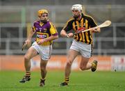 6 March 2011; David Redmond, Wexford, in action against Michael Fennelly, Kilkenny. Allianz Hurling League Division 1 Round 3, Kilkenny v Wexford, Nowlan Park, Kilkenny. Picture credit: Stephen McCarthy / SPORTSFILE